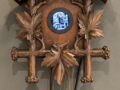 "Upgrade Your Time ©Germany" Single-channel video installation in a modified cuckoo clock | Objet trouvé with integrated monitor, Figure, video and synchronized sound reproduction in end loop Object: Unique Integrated video work: edition of 5 2026